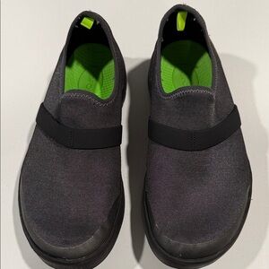 OOFOS Dark gray and black slip ons.